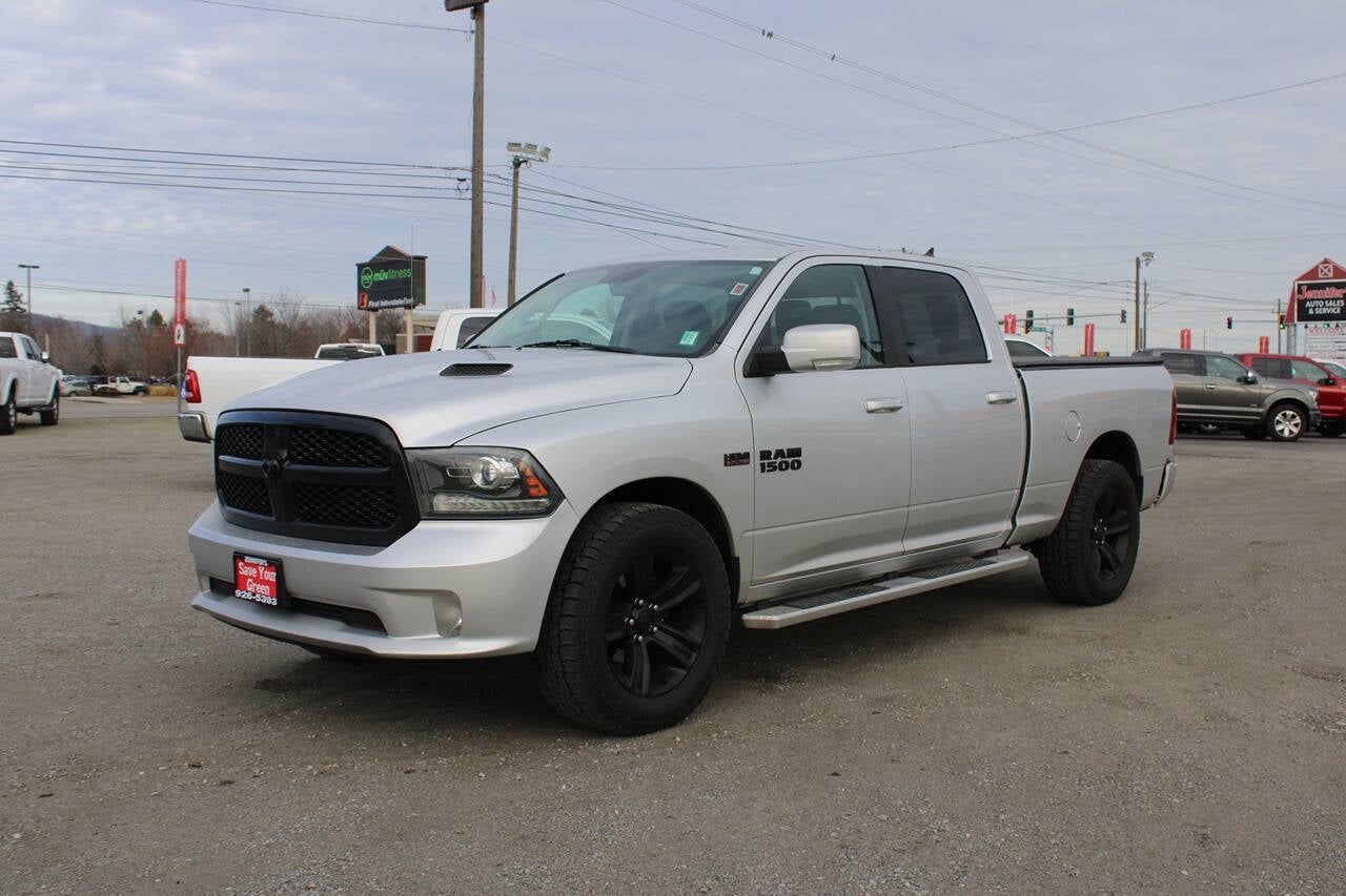 2017 RAM 1500 Night 4x4 4dr Crew Cab 6.3 ft. SB Pickup in Bright Silver Metallic Clear Coat — front three-quarter view