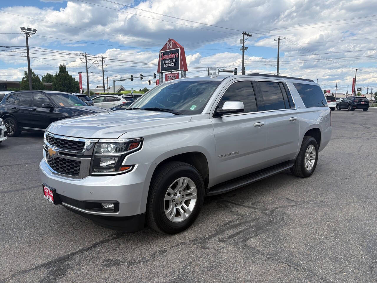 2016 Chevrolet Suburban LT 4x4 4dr SUV in Silver Ice Metallic — front three-quarter view