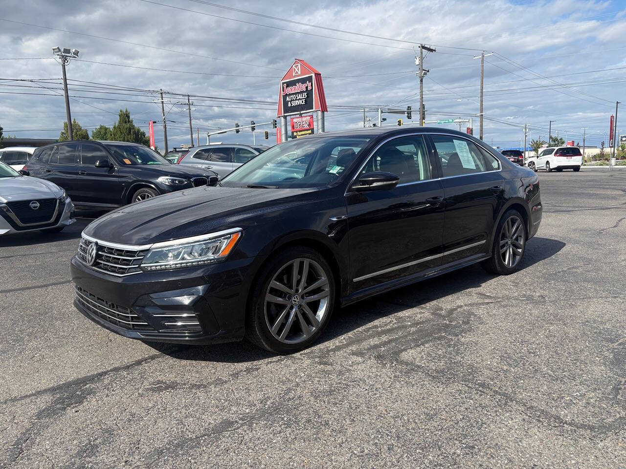2019 Volkswagen Passat SE R Line 4dr Sedan in Deep Black Pearl — front three-quarter view