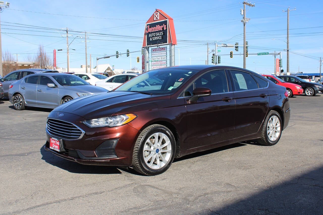 2019 Ford Fusion SE 4dr Sedan in Rich Copper Metallic Tinted Clearcoat — front three-quarter view