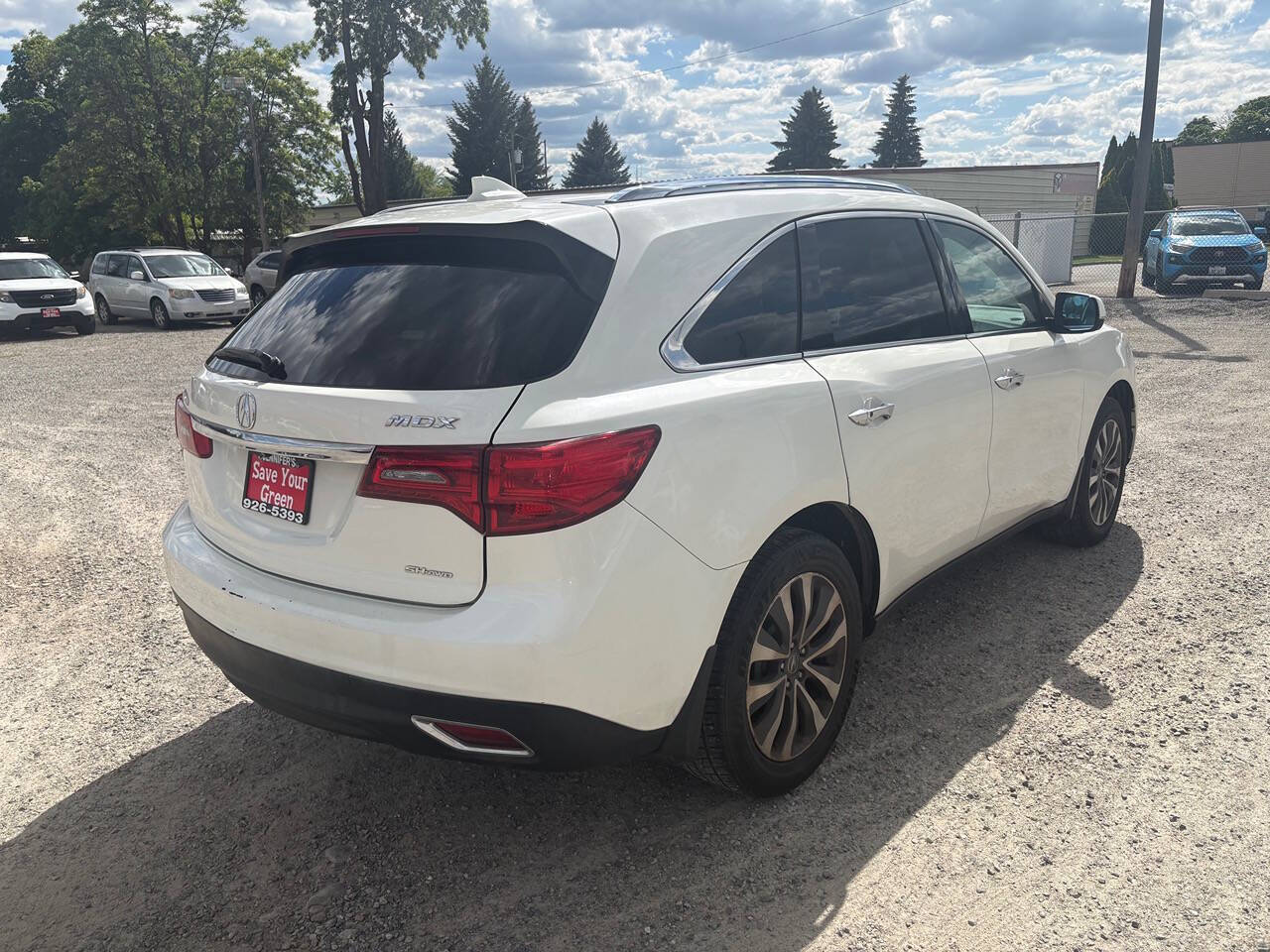 2016 Acura MDX — rear three-quarter view