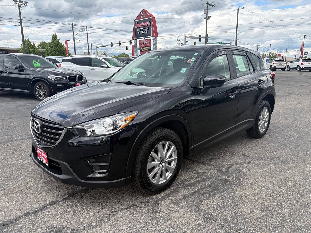 2016 Mazda Mazda CX-5 Sport AWD 4dr SUV in Jet Black Mica — front three-quarter view