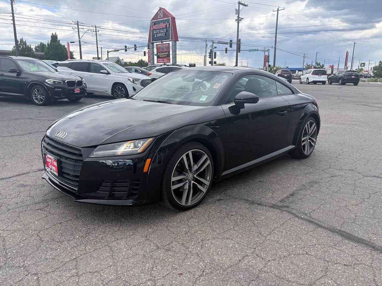 2016 Audi TT 2.0T quattro AWD 2dr Coupe in Brilliant Black — front three-quarter view